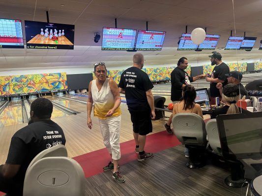 People enjoying bowl-a-thon 2024