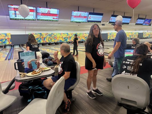 People enjoying bowl-a-thon 2024